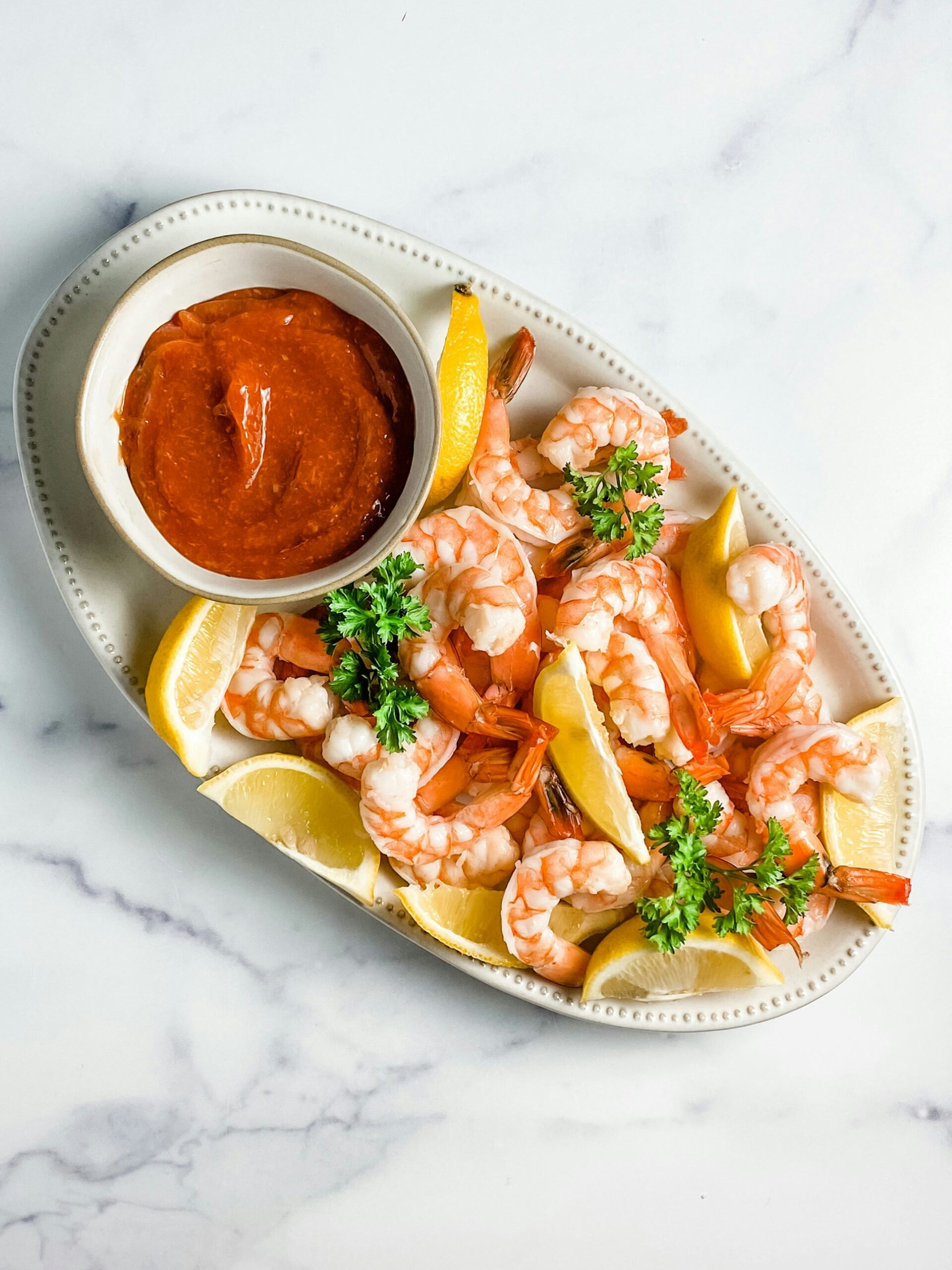 Another Ten Years? Absolutely! Celebratory shrimp platter with buffalo sauce. Image by Sheri Silver via Unsplash.